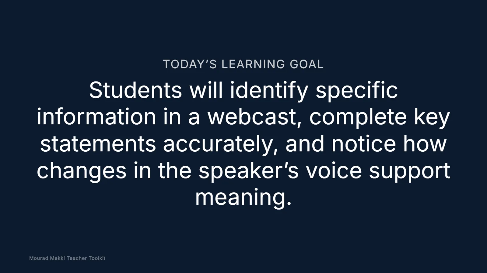 The projector window on navy showing only Today’s learning goal in large type.